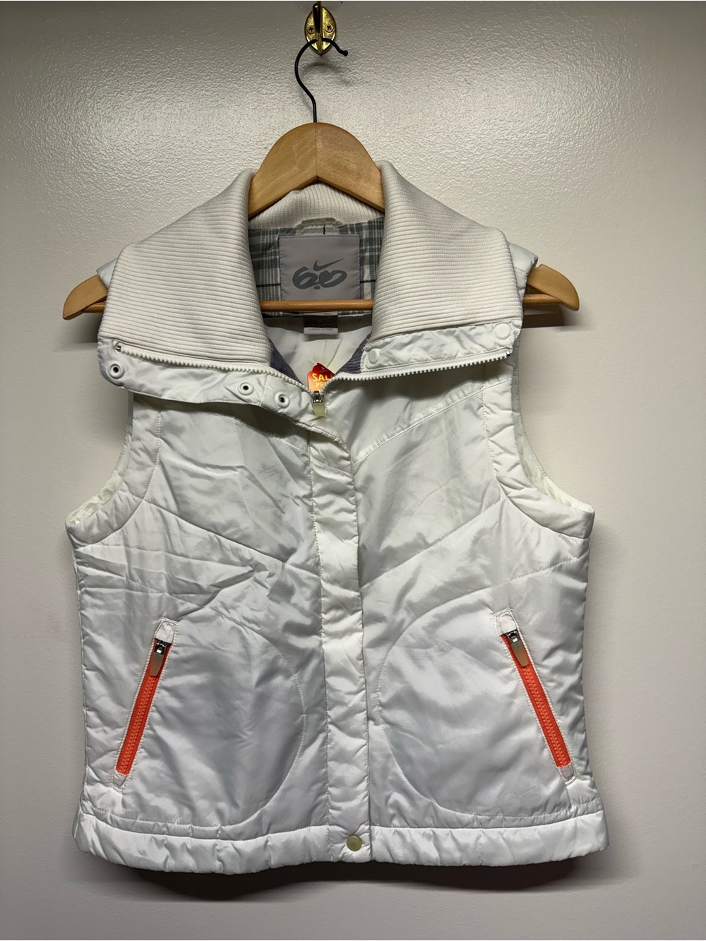 Nike White Quilted Sleeveless Vest with Orange Zip Accents